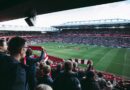 Fans raising the banner high after Liverpool wins 2-0 against Totten ham FC